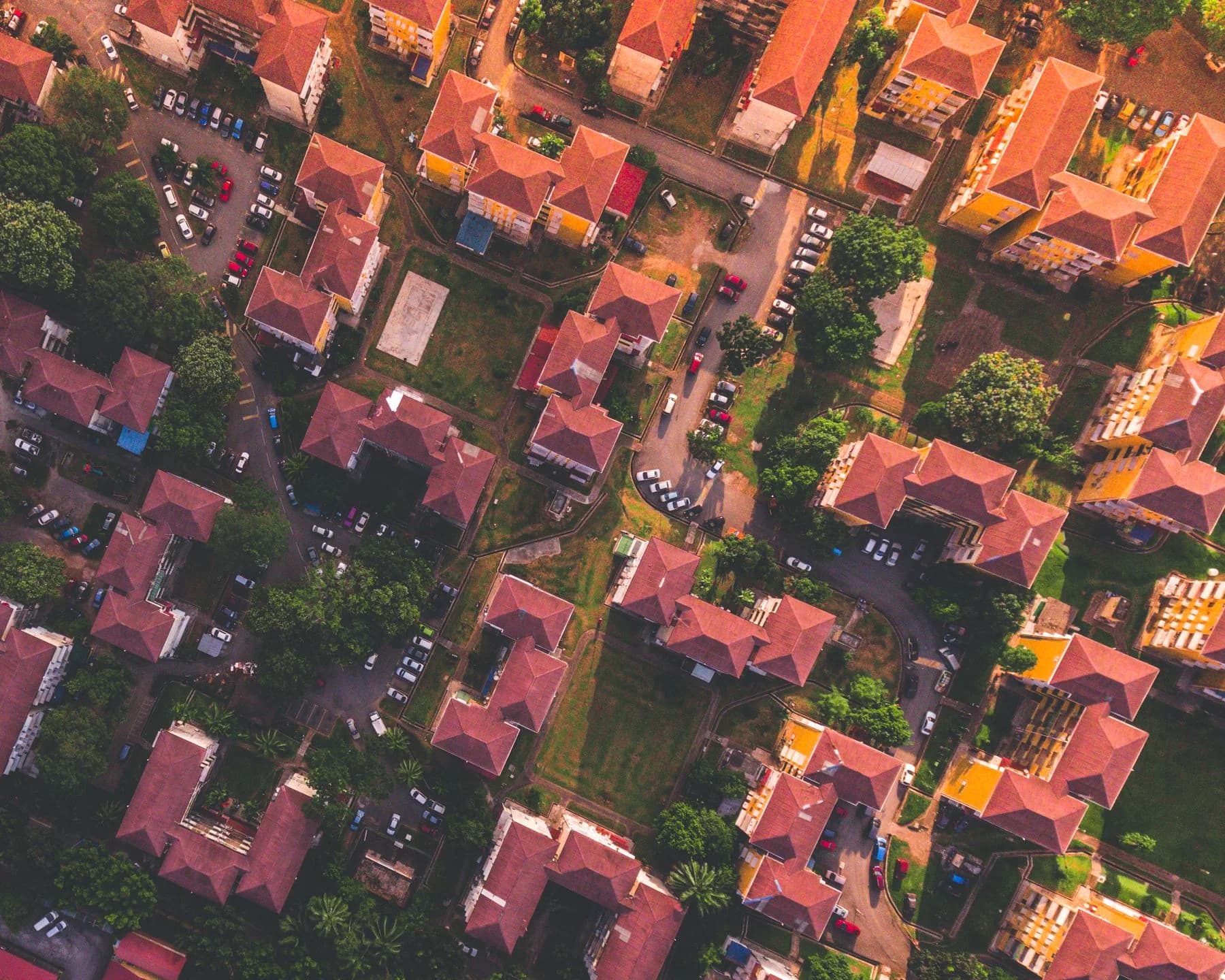 Aerial view of a residential neighborhood; illustrative stock photography, not a Broom Home listing.