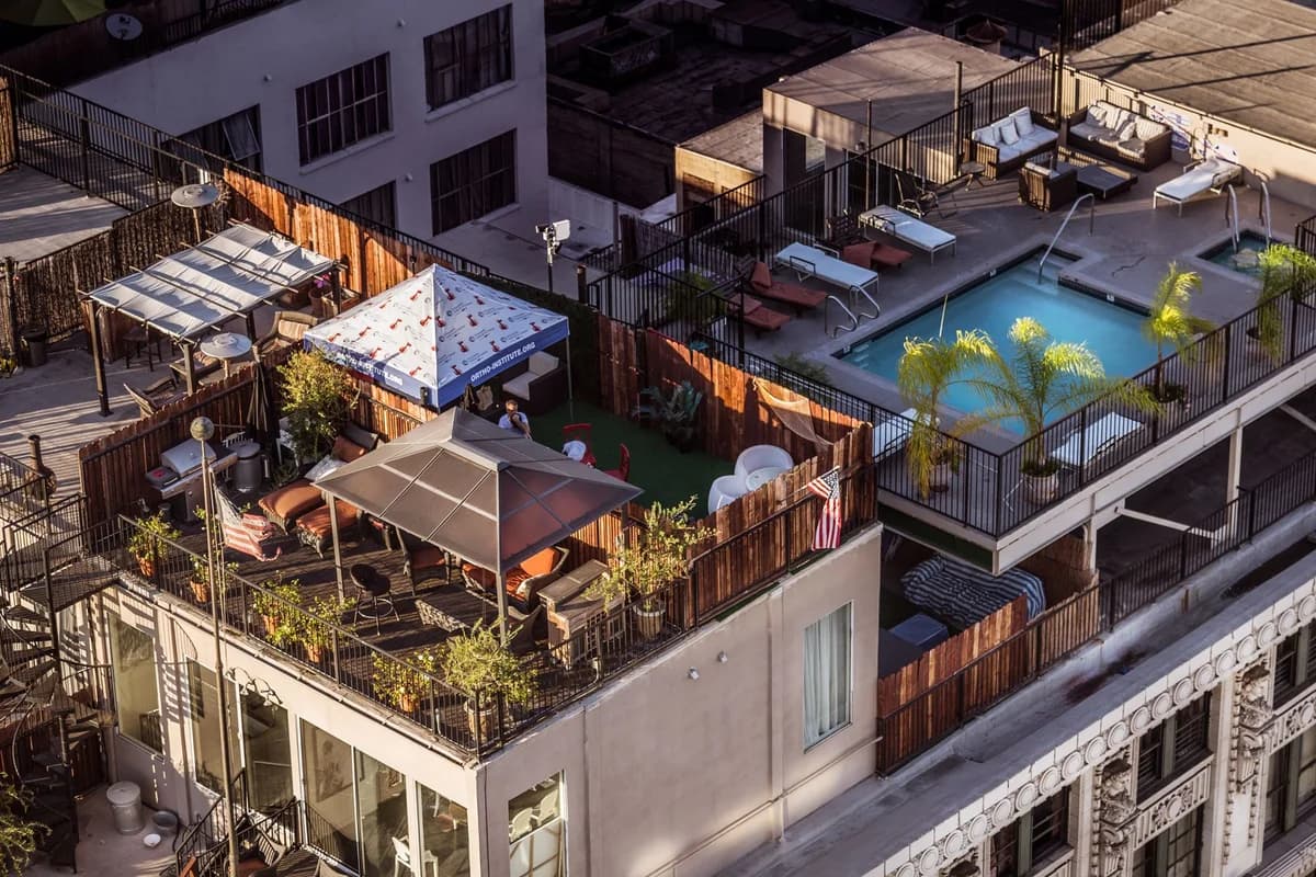 An urban rooftop terrace and surrounding buildings; illustrative stock photography, not a Broom Home listing.